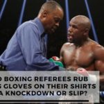 Why do boxing referees rub fighter’s gloves on their shirts after a knockdown or slip